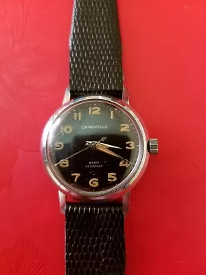 Vintage 70s Silver Color CARAVELLE By BULOVA Mid-size Black Dial Watch • $17.99