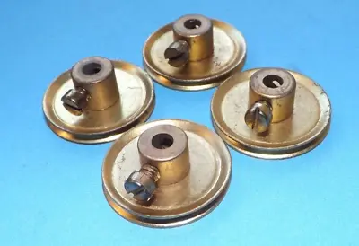 Four Meccano Pulley Wheels Part 22     • £1.20