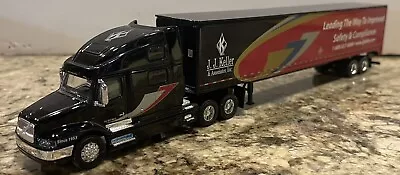 SpecCast 1/64 JJ Keller Volvo 770 Semi Tractor 53' Trailer Truck MINT #31504 • $29.99