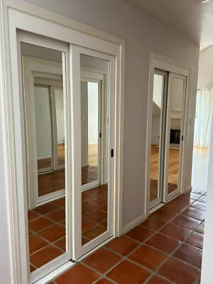 Solid Wood Mirrored Sliding Closet Doors • $350