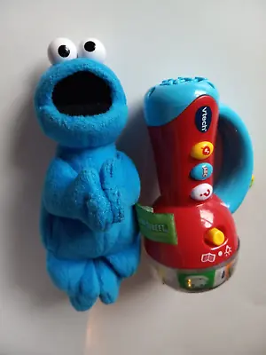 Cookie Monster Stuffed Animal And Vtech Spin And Learn Color Flashlight. • $8