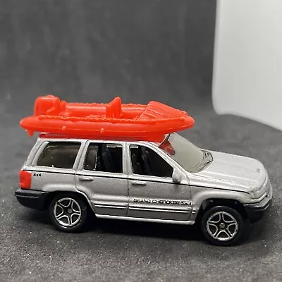 1999 Matchbox Jeep Grand Cherokee  W Raft By Mattel • $6.99