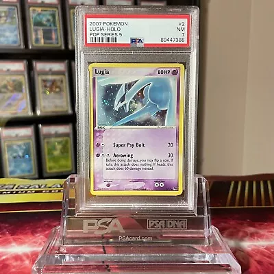 PSA 7 NM Lugia 2/17 Cosmos Holo 2007 Pokemon POP Series 5 *BEAUTIFUL SWIRL* • $129.99