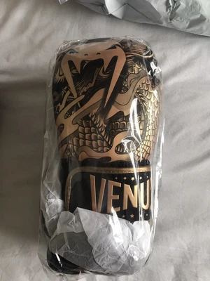 £75 • Buy Venum Dragon's Flight Boxing Gloves Black/Bronze 14oz NEW