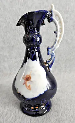 Dark Blue And White Porcelain Vase With Cherub Picture • $10.99