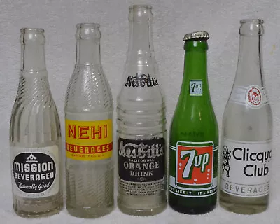 LOT Missoula Montana Soda Bottles ACL Embossed Mission NEHI Nesbitts 7Up Cliquot • $49