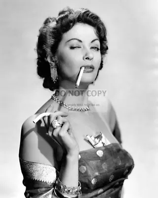 YVONNE DE CARLO W/ CIGARETTE IN HER MOUTH AND PACK IN BOSOM 8X10 PHOTO (ZY-978) • £8.56