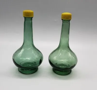 Vintage Salt And Pepper Shakers Green Glass Yellow Lids 4.5  Tall • $9.95