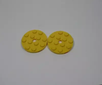 LEGO Lot Of 2 Yellow Round 4x4 Plates H4 • $1.09