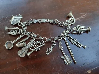 Vintage Sterling Silver Musical Charm Bracelet • $260