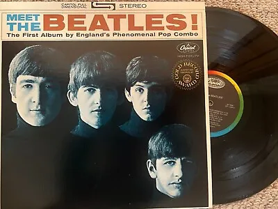 The Beatles *Meet The Beatles* 1983 US Capitol Rainbow RE Stereo LP - ST 2047 • $42.99