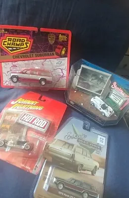 Lot Of 4 Die Cast Cars In The Packages • $16.50