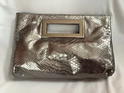 Michael Kors Silver Clutch Pre Owned EUC • $55