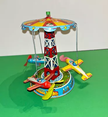 Working Vintage Tin Toy Japan Air Carrousel With Airplanes Lever Driven • $14.95