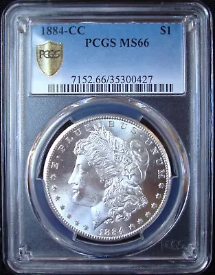 1884-CC Morgan Silver Dollar - PCGS MS 66 - Gold Shield • $1197