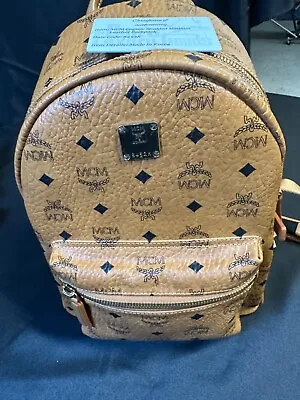 MCM Cognac Monogram Backpack • $699