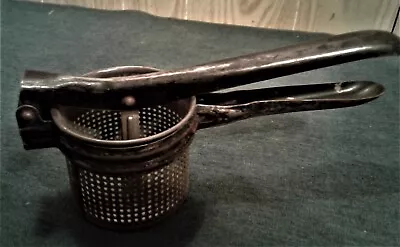 Vintage Potato Ricer - Masher - Juicer With A Black Handle • $7.50