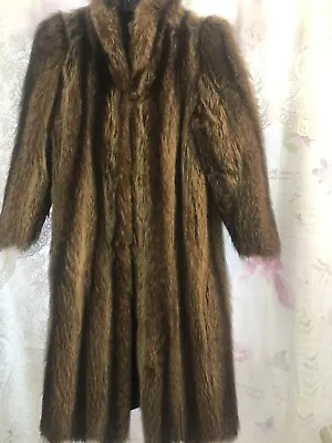 Womens Fur Coat (raccoon) • $250