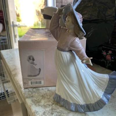 £15.99 • Buy Lladro Nao 1391 Caught In The Breeze .There Is A Small Chip