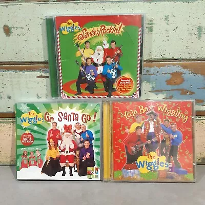 3 THE WIGGLES CDs Christmas Go Santa Go! & Santa's Rockin'! & Yule Be Wiggling • $13