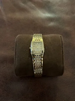 Vintage Oleg Cassini Gold Tone Stainless Steel Japan QzMov. 4 Gems Wristwatch 8  • $25