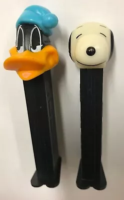 PEZ Retired Looney Tunes Daffy Duck & Snoopy Dog Both On 4.9 Hungary Black Stems • $9.99