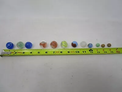 Lot Of 12 Vintage Marbles Shooters Cats Eye Clay • $9.99