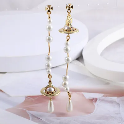 Vivienne Westwood Gold And Pearl Earrings - • $32.99