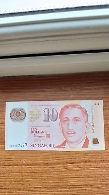 Leftover Holiday Money  $10 SINGAPORE / SINGAPORE $10 (2005) Polymer UNC   • £8.75