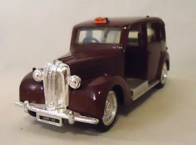 Ertl 1/43 Die Cast Fx3 London Taxi Maroon • $3.99