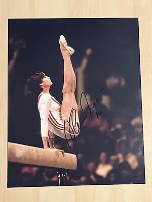 NADIA COMANECI HAND SIGNED 8x10 PHOTO OLYMPICS GYMNAST AUTOGRAPHED GOLD RARE COA • $49.99