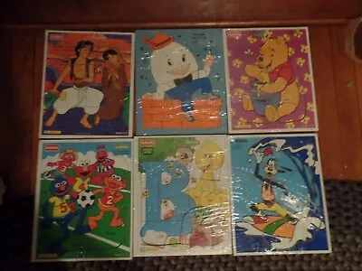 Vintage Playskool Wooden Puzzles Disney Sesame Street • $35