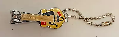 Guitar Shaped Nail Clipper Keychain Yellow USED • $7.99