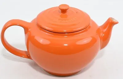 LE CREUSET Stoneware: Classic Round Teapot 1L Orange. • £34.99