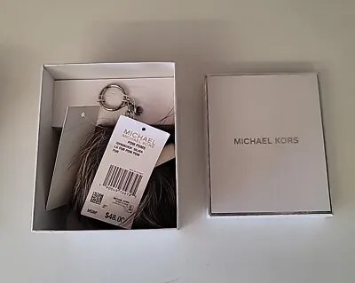 Michael Kors LG Fur Pom Pom Silver  • $45