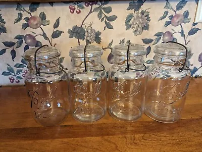 $60 • Buy 4- Vintage Ball Ideal Quart Clear Fruit Jars With Glass Lids Wire Clamp