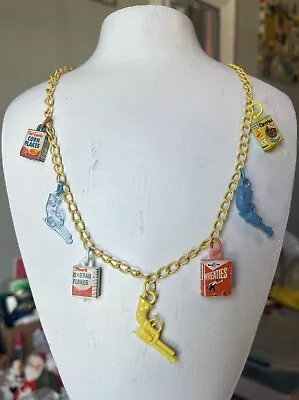 CEREAL KILLER Vintage Cracker Jack Gum Ball Prize Charm Necklace Gun Yellow • $42