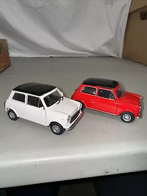 *BRAND NEW* Lot Of 2 Welly Diecast Cars Mini Cooper 1300 Red White 4 Inch • $10.99