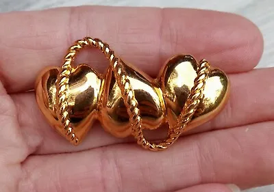 Vintage Monet Gold Tone Triple Heart Rope Brooch Pin • $10