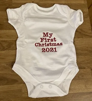 My First Christmas Baby Grow • £4.99