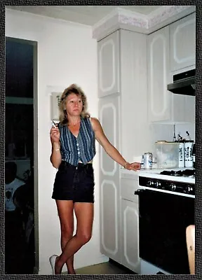 Vintage Photograph Sexy Young Woman Smoking Cigarette In Kitchen • $7