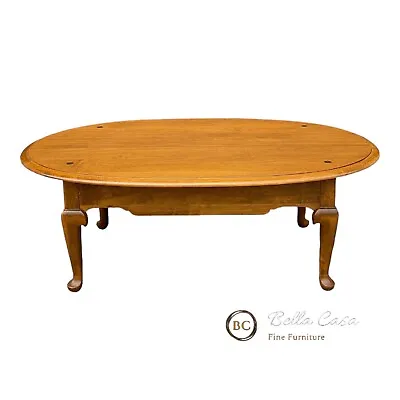 1980s Ethan Allen Heirloom Nutmeg Maple Traditional Queen Anne Oval Coffee Table • $525