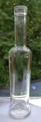 Antique Bottle Glass 8  Tall Long Neck Cork Top Embossed CAP FL 4oz Iridescent • $35