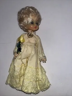 Vintage Symbol Of Quality 8  Doll Number #7021 Victorian Girl With Yellow Dress • $18.99