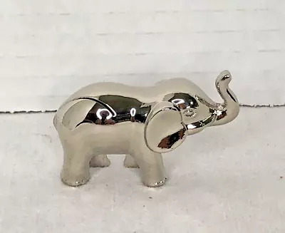 Miniature Elephant Figurine Metal Stainless Trunk Up High Polish 1 1/4 H X 2  • $14