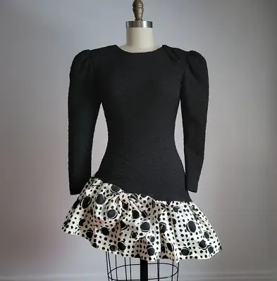 VTG 80's BLACK & WHITE ASYMETRIC SHORT DRESS W/ RUFFLE HEMLINE & STRONG SHOULDER • $69