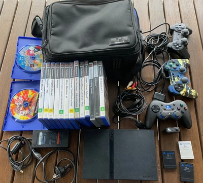 $99 • Buy PS2 Console Slim- With Cables, Controllers (x4)games And Cary Bag.