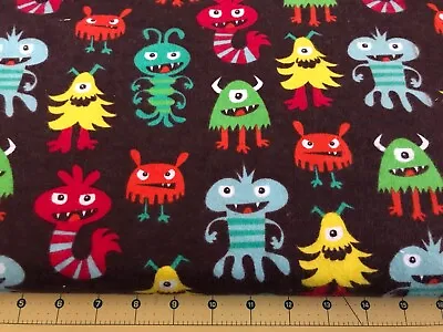 Monster Mania On Brown Flannel Fabric Sold By The Yard #1002 • $5.39