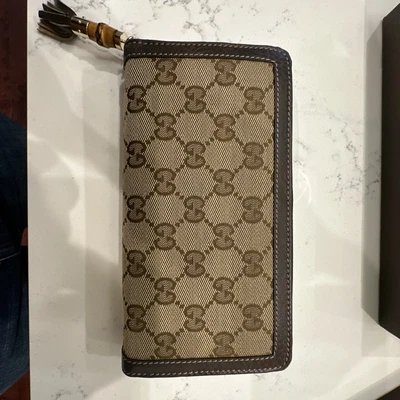 $400 • Buy GUCCI Authentic GG Bamboo Tassel Round Zip Around Canvas Wallet( NEW)