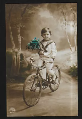 Early Hand Coloured Real Photo Postcard: Cycling Boy In Sailor Suit. Flowers • £3.50